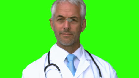 Arzt-Wirft-Eine-Münze-In-Die-Luft-Auf-Einem-Grünen-Bildschirm