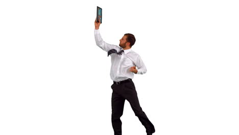 Businessman-jumping-up-holding-tablet-pc