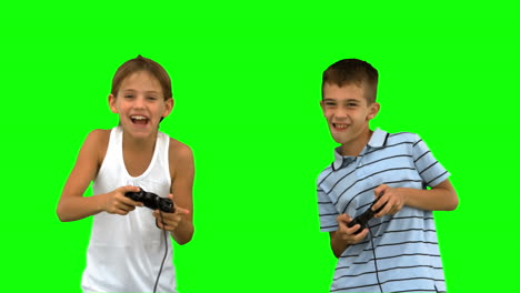 Siblings-playing-video-games-on-green-screen