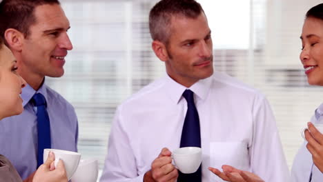 Business-people-having-a-coffee-together-