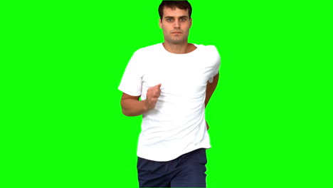 Handsome-man-jogging-on-green-screen