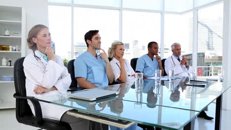 Medical-team-listening-and-applauding