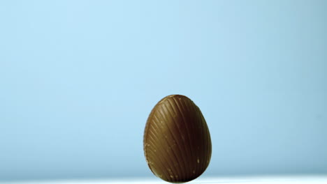 Easter-egg-revolving-on-blue-background