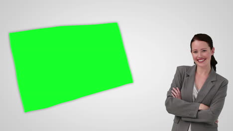 Animation-of-smiling-businesswoman-presenting-a-green-screen