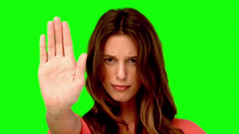 Woman-showing-the-stop-sign-with-her-hand