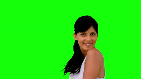 Athletic-woman-tossing-her-hair-on-green-screen