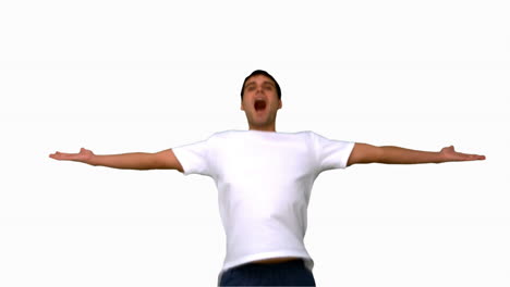 Handsome-man-jumping-and-raising-arms-on-white-screen