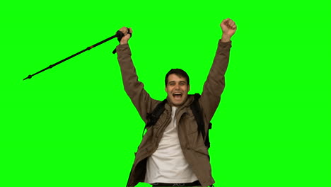 Happy-man-throwing-his-hat-on-green-screen