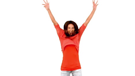 Cheerful-woman-jumping-against-white-background
