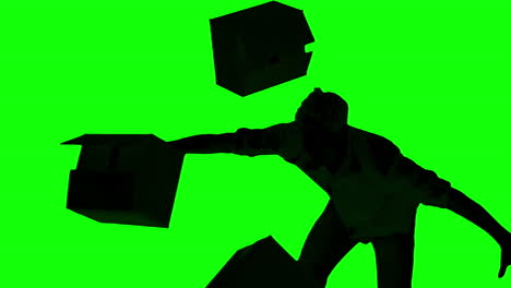 Silhouette-of-clumsy-man-dropping-boxes-on-green-screen