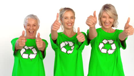 Three-enviromental-activists-giving-thumbs-up