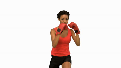 Woman-boxing-on-white-screen-in-slow-motion