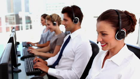 Smiling-call-centre-agents-with-headset