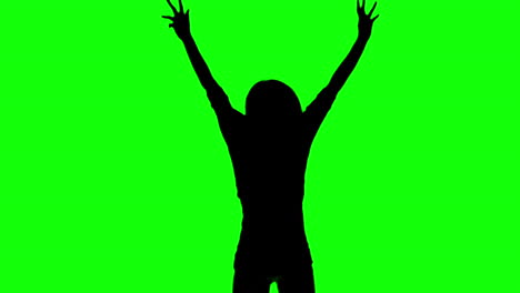 Silhouette-Einer-Frau,-Die-Auf-Einem-Grünen-Bildschirm-Springt