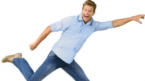 Smiling-man-jumping-on-white-background
