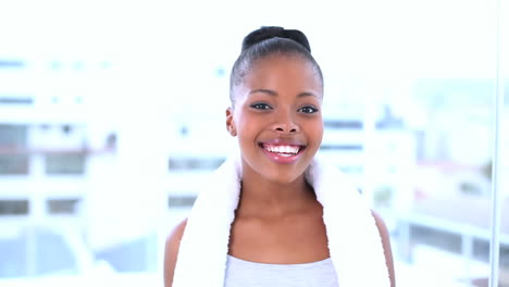 Smiling-model-drying-her-forehead