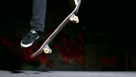 Skater-doing-ollie-trick-on-concrete