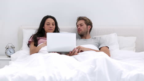 Couple-using-the-laptop-together