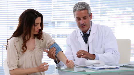 Doctor-checking-blood-pressure-of-the-patient