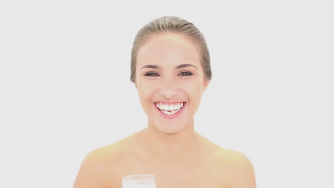 Beautiful-model-drinking-glass-of-milk