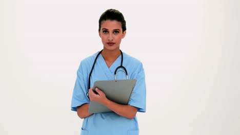 Bestürzt-Schöne-Krankenschwester-Einen-Bericht-Ausfüllen