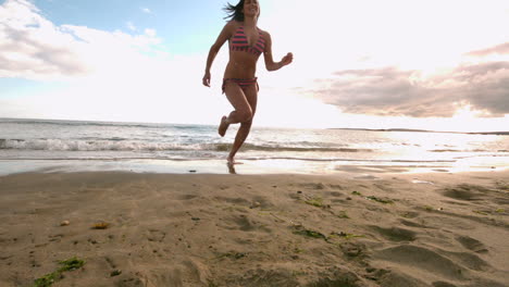 Woman-running-away-from-sea