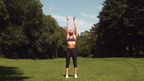 Sporty-woman-doing-breathing-exercise