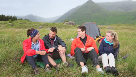 Friends-on-a-camping-trip-chatting-together