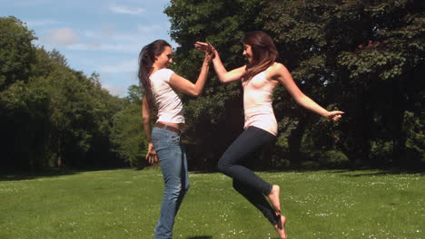 Two-young-friend-giving-high-five