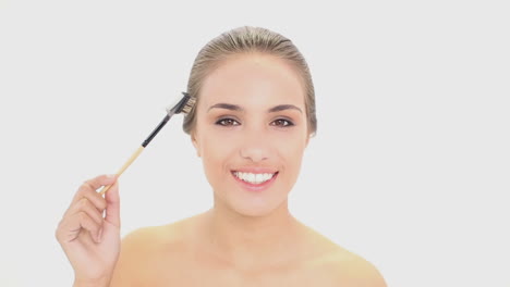 Beautiful-model-using-an-eyebrow-brush