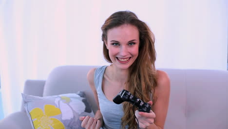 Happy-model-playing-video-games-on-the-couch
