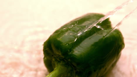 Water-pouring-on-green-pepper