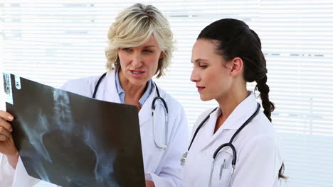 Doctor-and-nurse-discussing-xray
