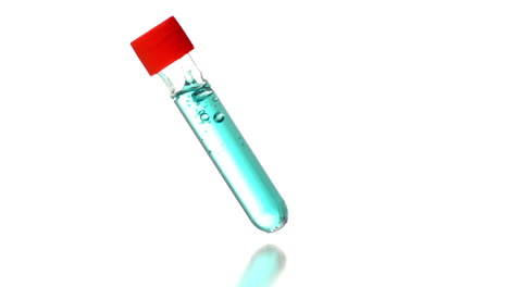 Test-tube-falling-and-bouncing-on-white-background