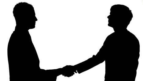 Silhouette-of-businessmen-shaking-hands-
