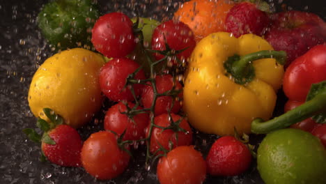 Water-raining-on-selection-of-fresh-fruit-and-vegetables