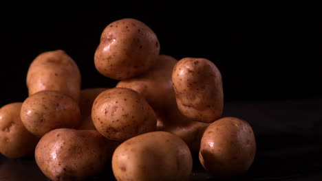 Potato-falling-on-pile-of-potatoes