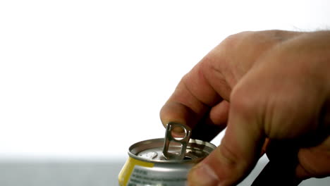 Hand-opening-a-soda-can