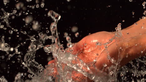 Water-pouring-over-female-hands