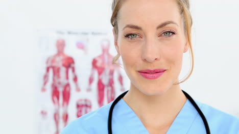 Pretty-nurse-smiling-at-the-camera