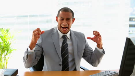 Businessman-working-at-his-desk