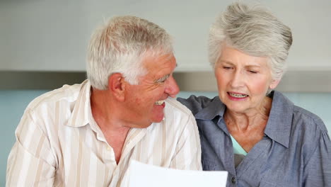 Senior-couple-organizing-their-bills