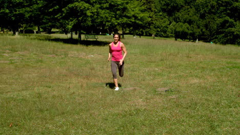 Fit-brunette-sprinting-towards-the-camera