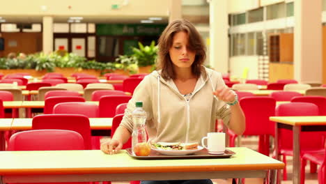 Upset-student-eating-lunch-alone