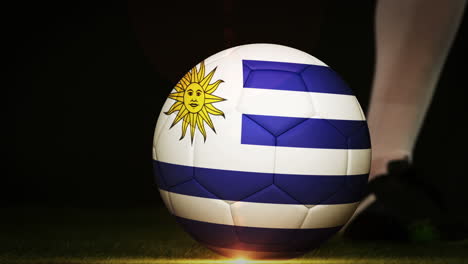 Jugador-De-Fútbol-Pateando-La-Pelota-De-La-Bandera-De-Uruguay