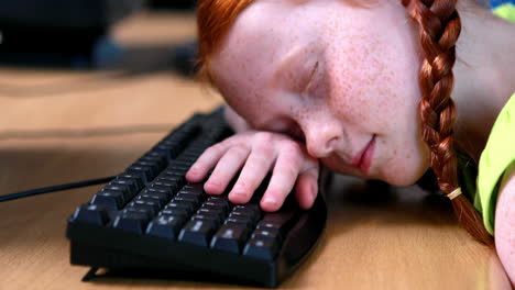 Little-girl-sleeping-on-keyboard