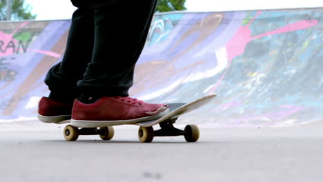 Young-skateboarder-skating-the-outdoor-skatepark