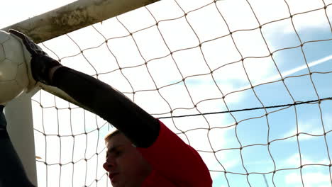 Goalkeeper-in-red-making-a-save