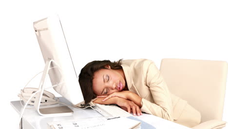 Businesswoman-sleeping-on-her-desk