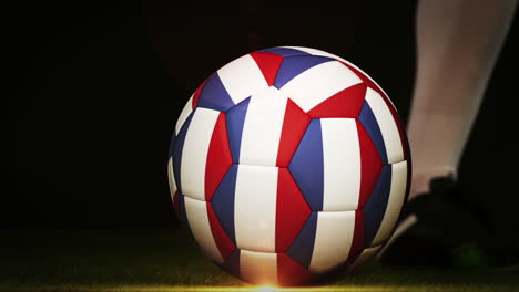 Football-player-kicking-france-flag-ball